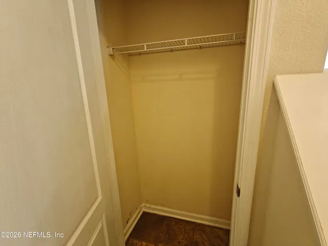 a kitchen with a stove a sink and a refrigerator