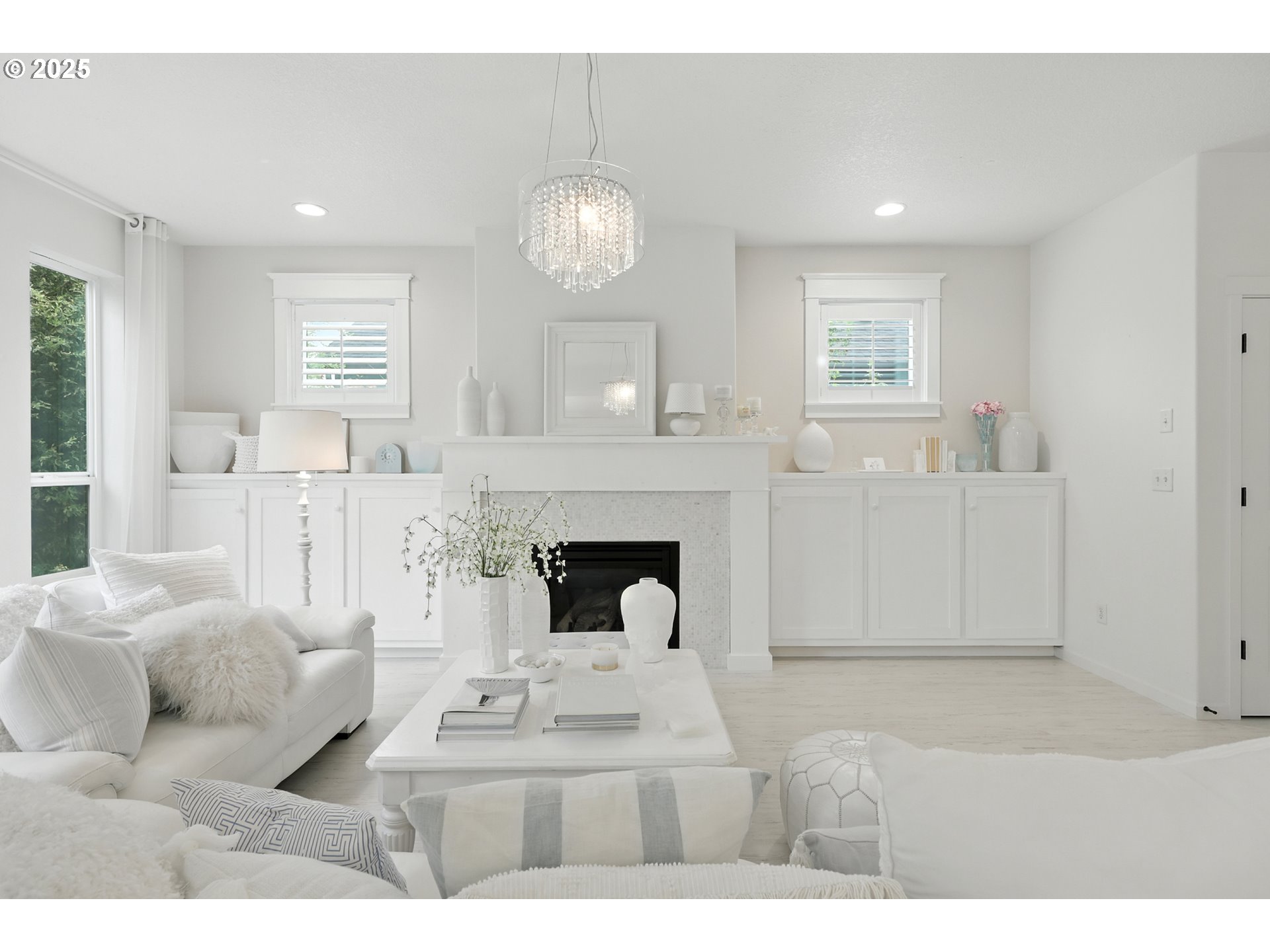 2210 South White Salmon Drive Ridgefield, WA 98642 - Photo 13 of 45 a living room with furniture and a fireplace
