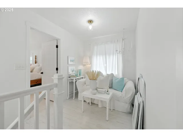 a bed room with a bed and a window