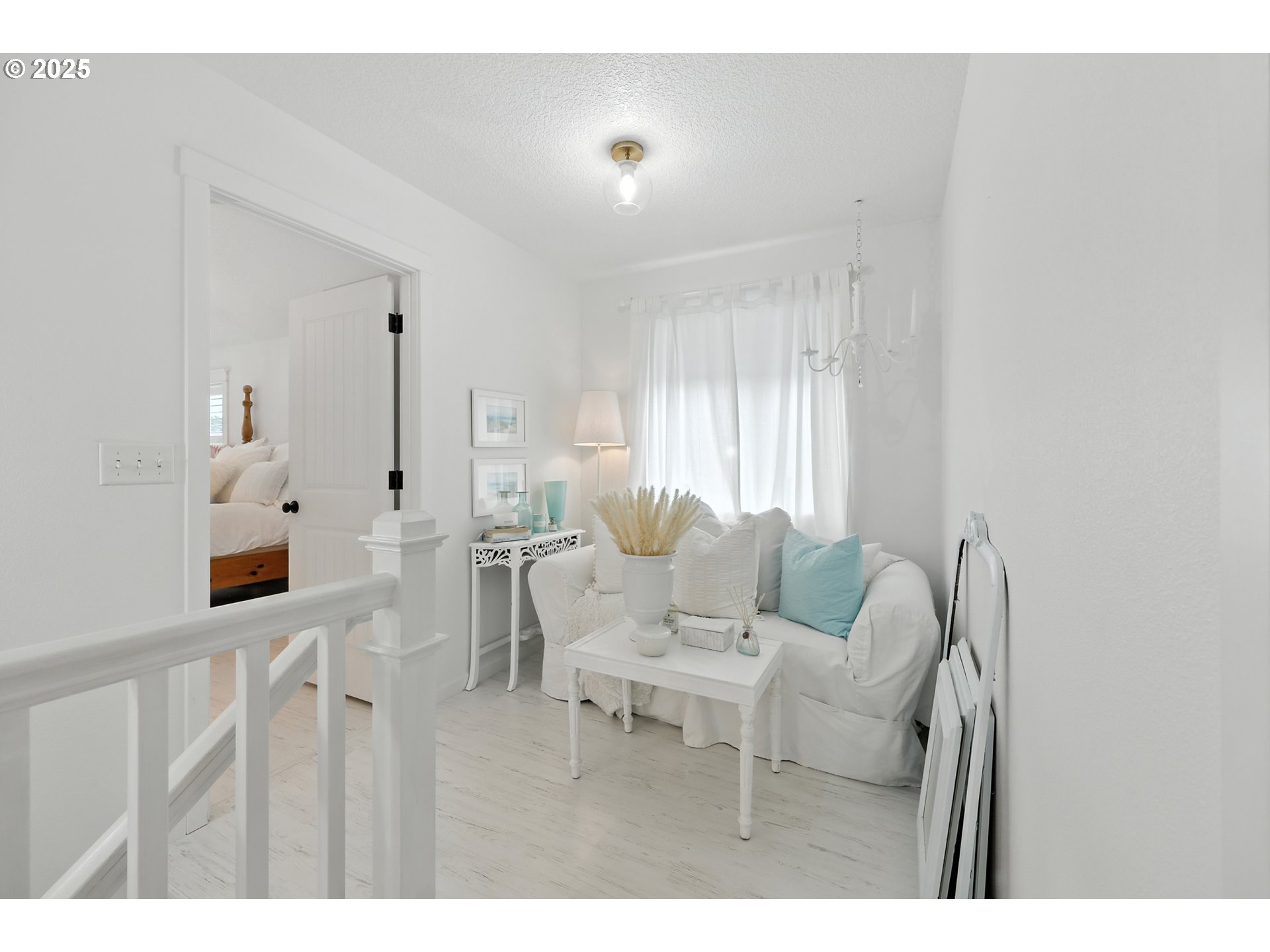 2210 South White Salmon Drive Ridgefield, WA 98642 - Photo 22 of 45 a living room with furniture and a large window