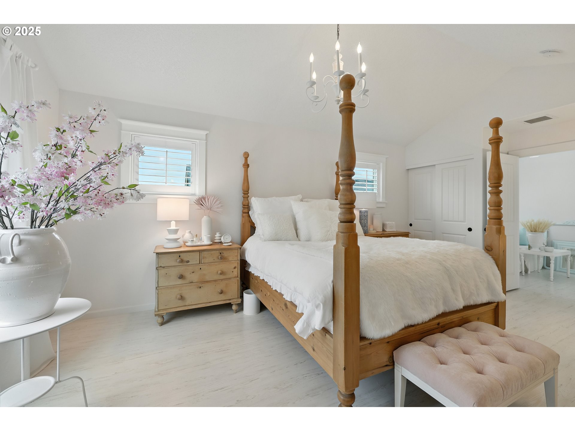 2210 South White Salmon Drive Ridgefield, WA 98642 - Photo 25 of 45 a bedroom with a bed and a potted plant