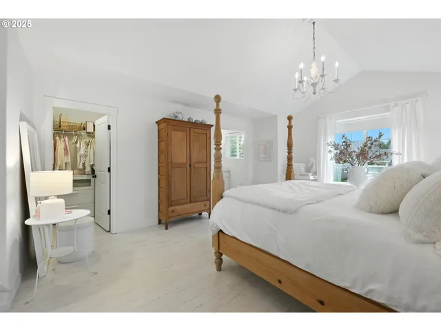 a living room with furniture white walls and white walls