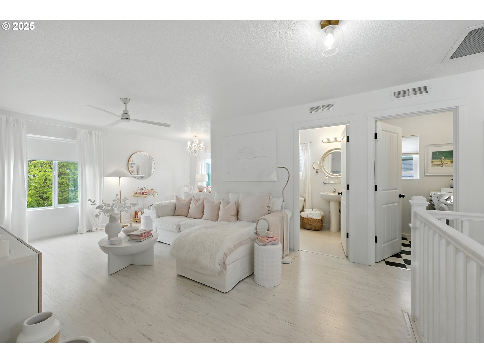 2210 South White Salmon Drive Ridgefield, WA 98642 - Photo 29 of 45 a living room with furniture white walls and white walls