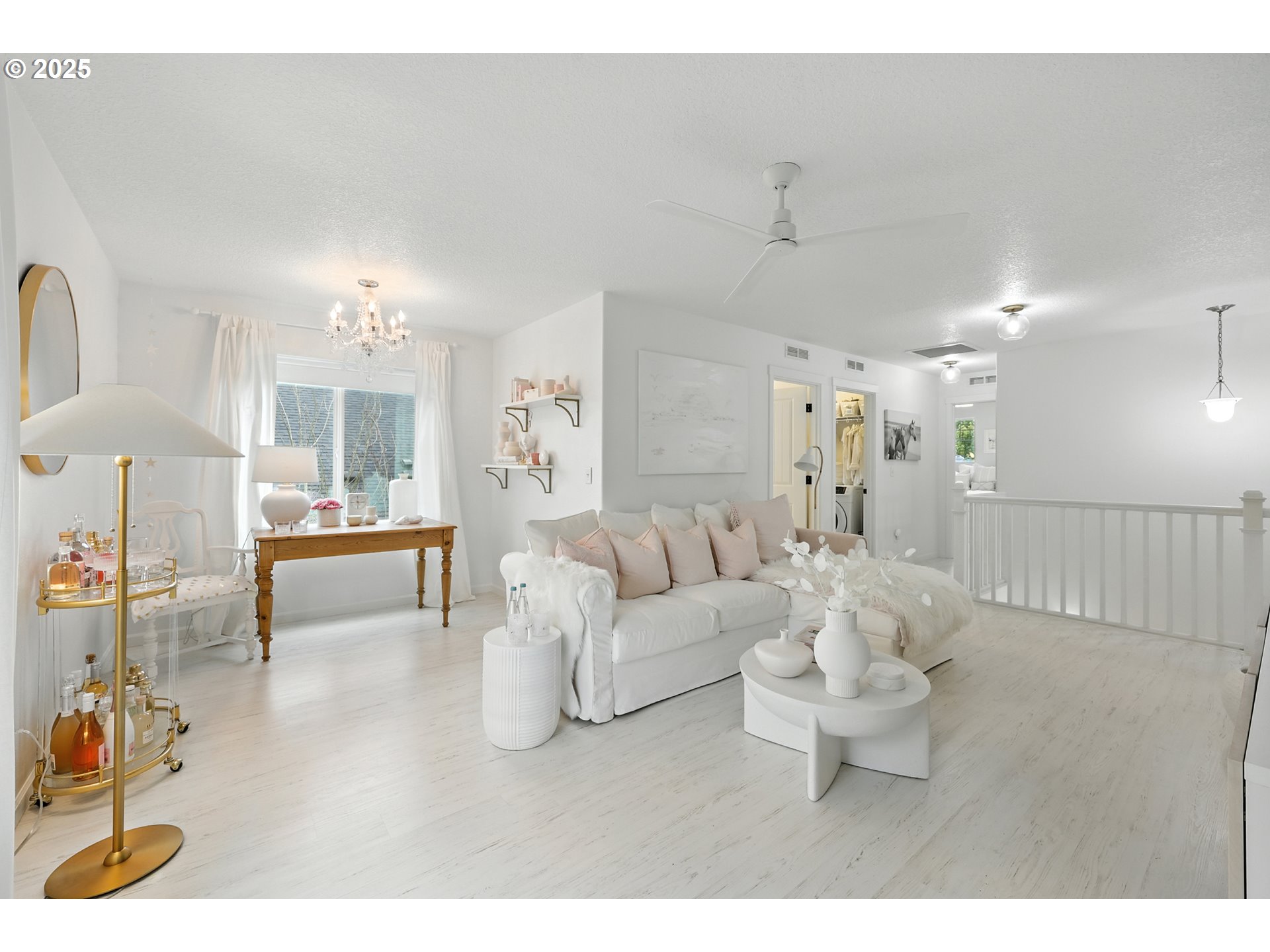 2210 South White Salmon Drive Ridgefield, WA 98642 - Photo 31 of 45 a living room with furniture and a table