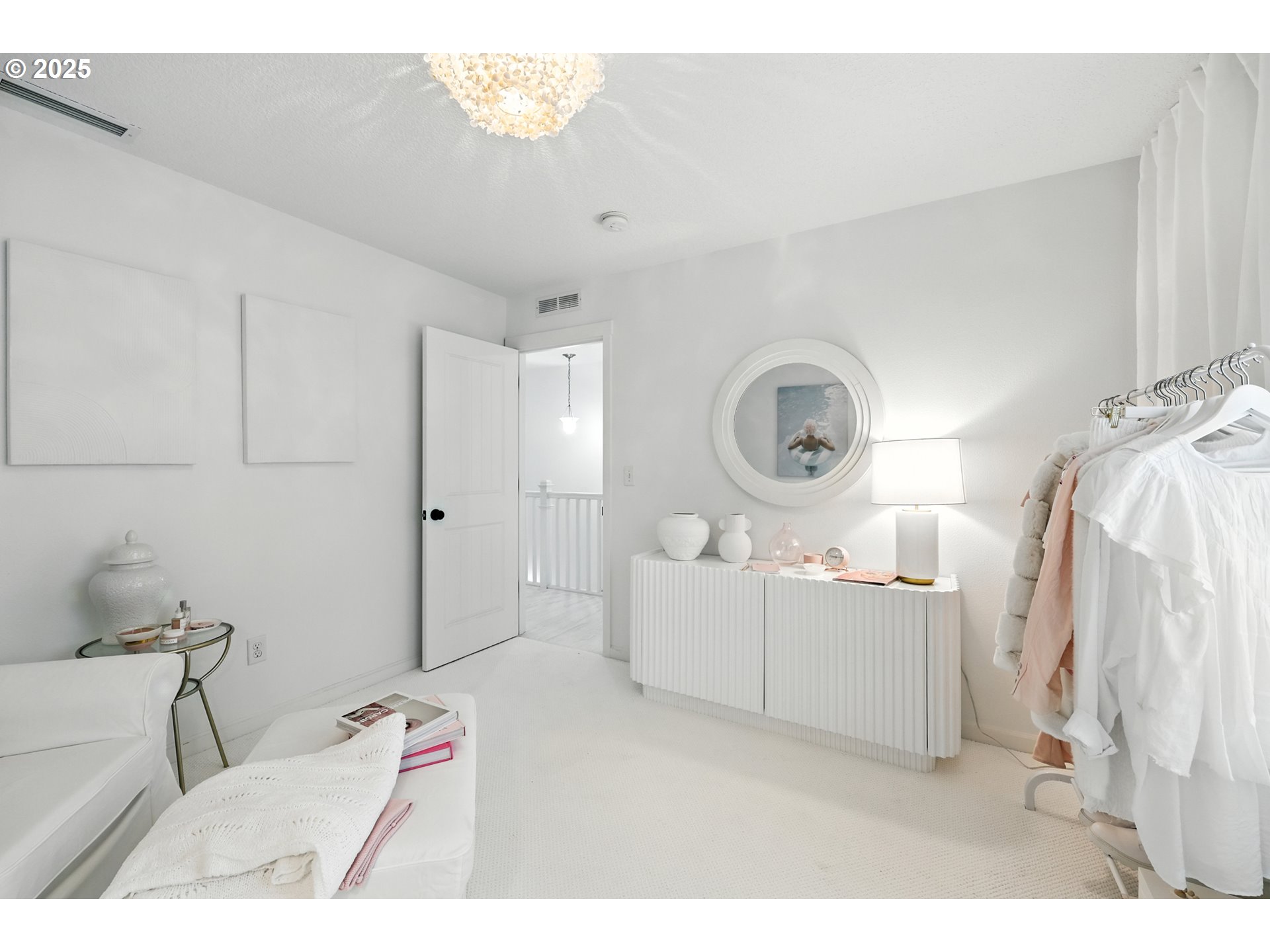 2210 South White Salmon Drive Ridgefield, WA 98642 - Photo 39 of 45 a living room with furniture and a clock