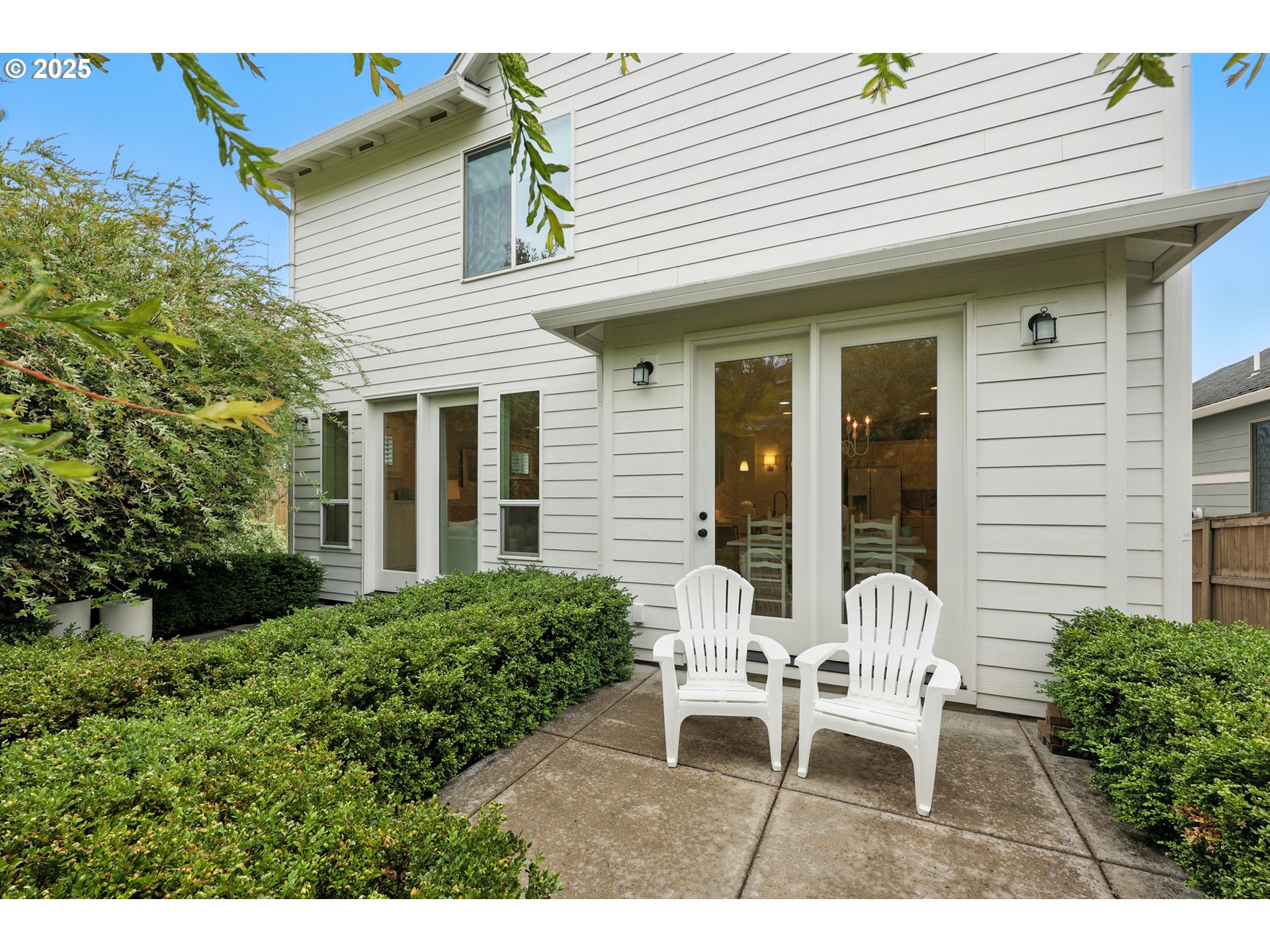 2210 South White Salmon Drive Ridgefield, WA 98642 - Photo 41 of 45 a view of a house with backyard and sitting area