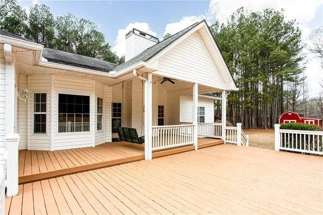 a kitchen with stainless steel appliances granite countertop a refrigerator and a stove