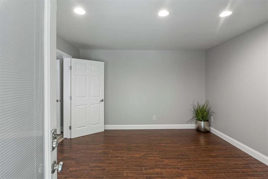 2115 Julien Overlook, Unit 2 Conyers, GA 30012 - Photo 5 of 13 a view of an empty room with wooden floor