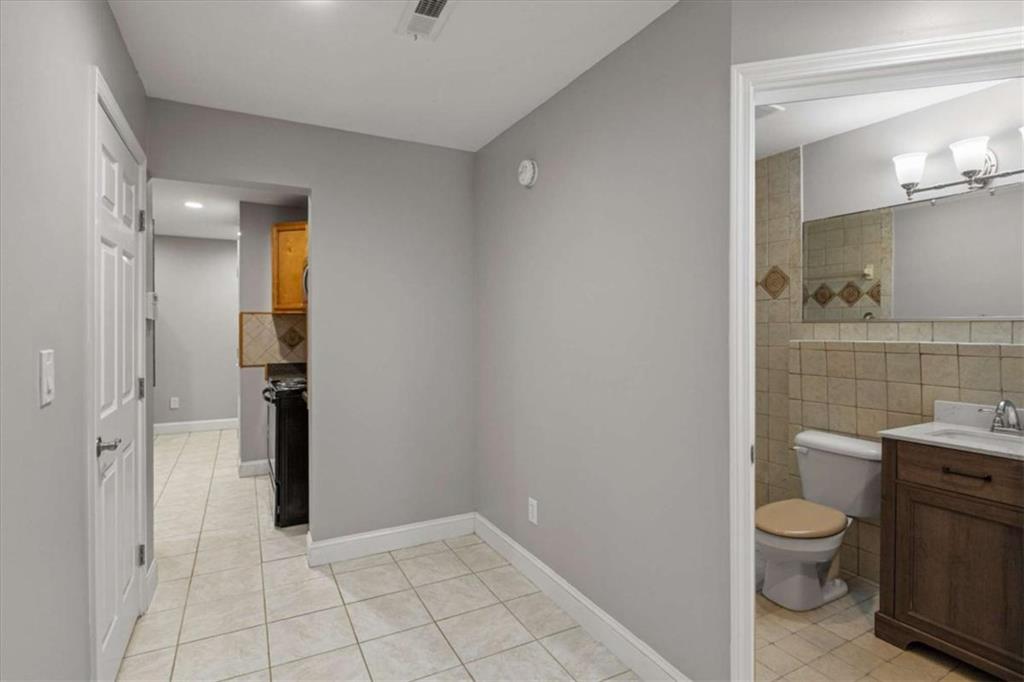 2115 Julien Overlook, Unit 2 Conyers, GA 30012 - Photo 10 of 13 a bathroom with a toilet