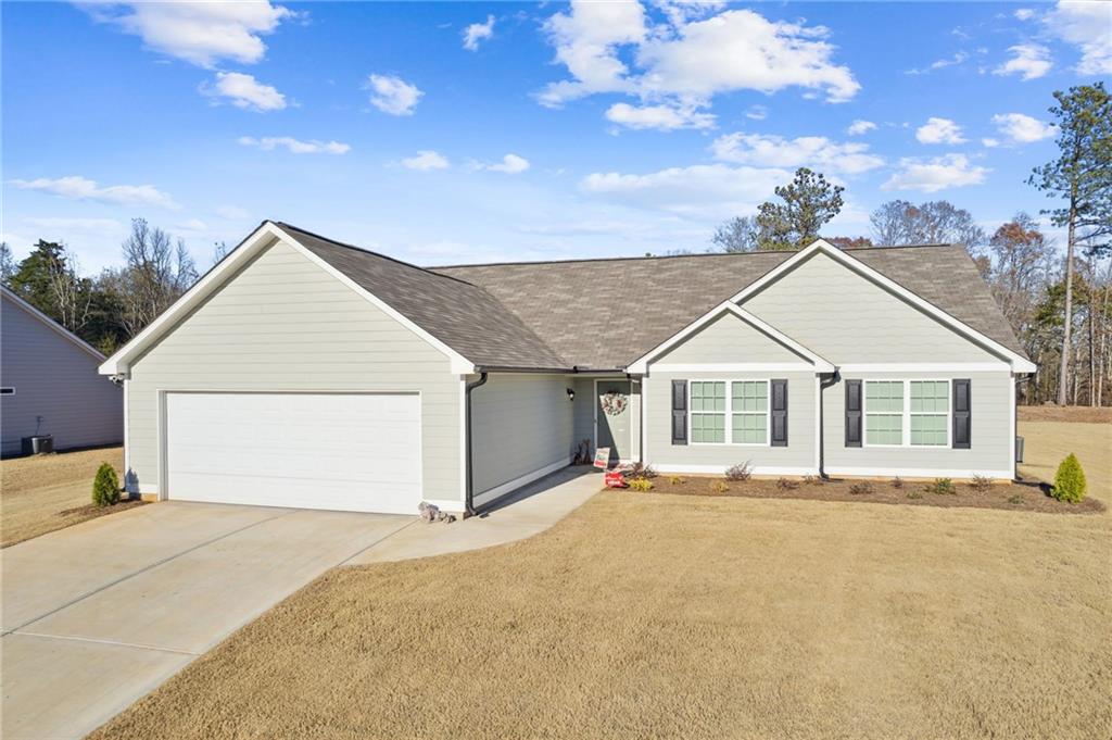 103 Joseph Lane Hartwell, GA 30643 - Photo 1 of 1 a view of house with yard and trees in the background