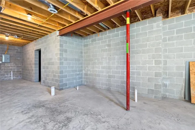 a view of a room with wooden walls