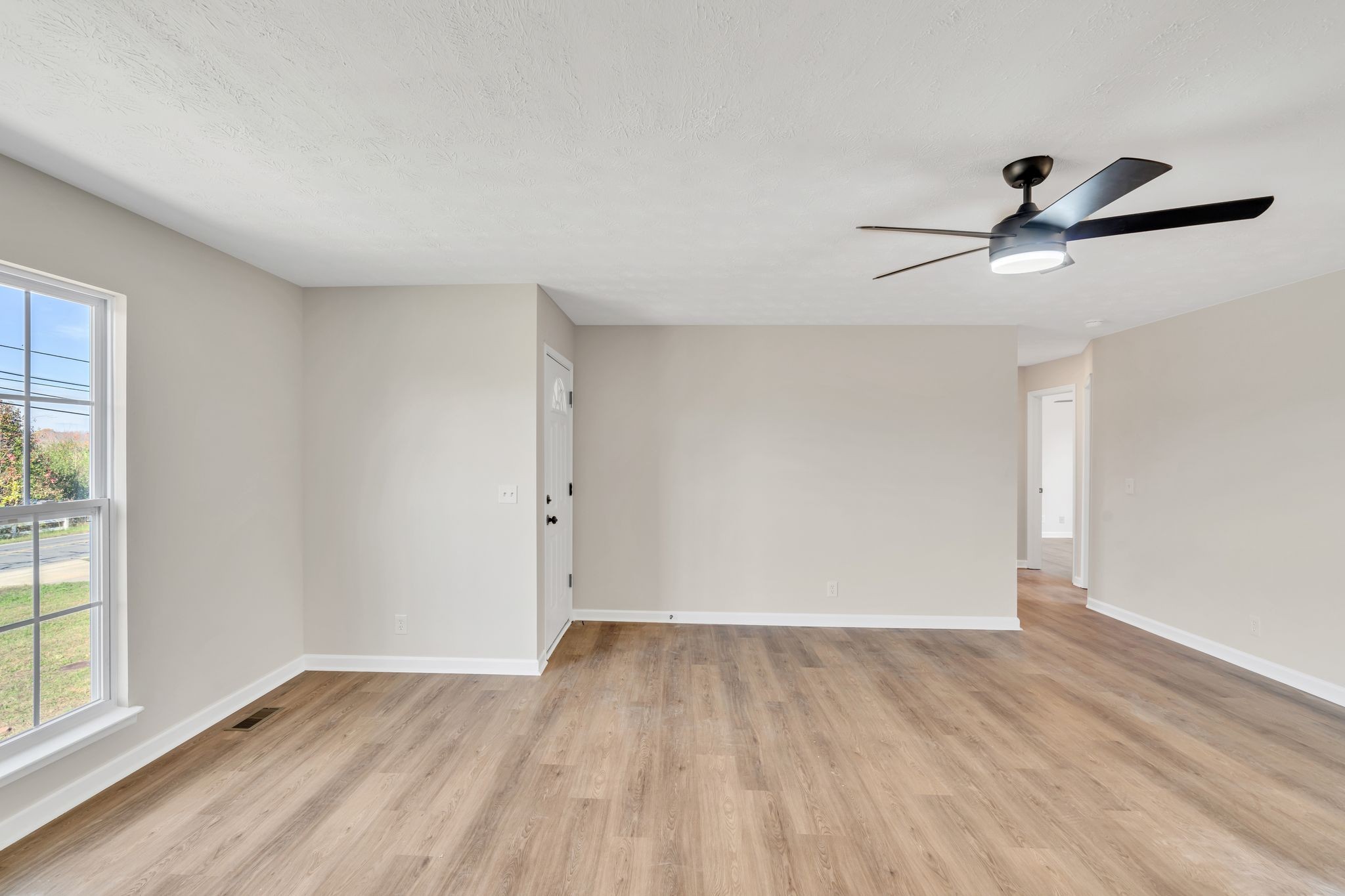 2338 South Main Street Springfield, TN 37172 - Photo 12 of 30 wooden floor in an empty room with a window