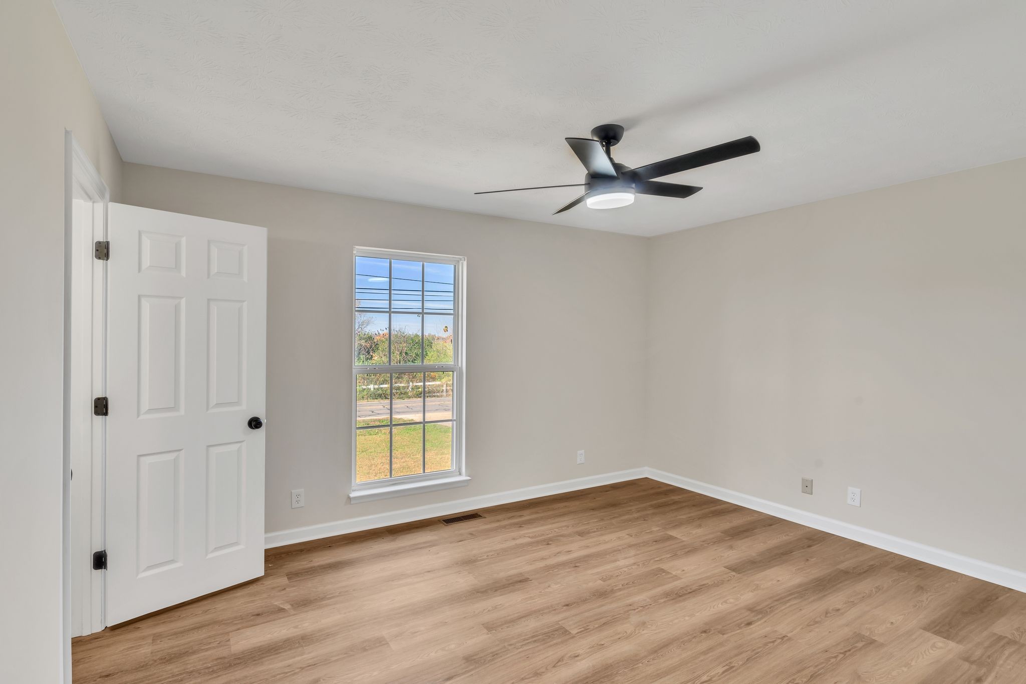 2338 South Main Street Springfield, TN 37172 - Photo 13 of 30 wooden floor in an empty room with a window
