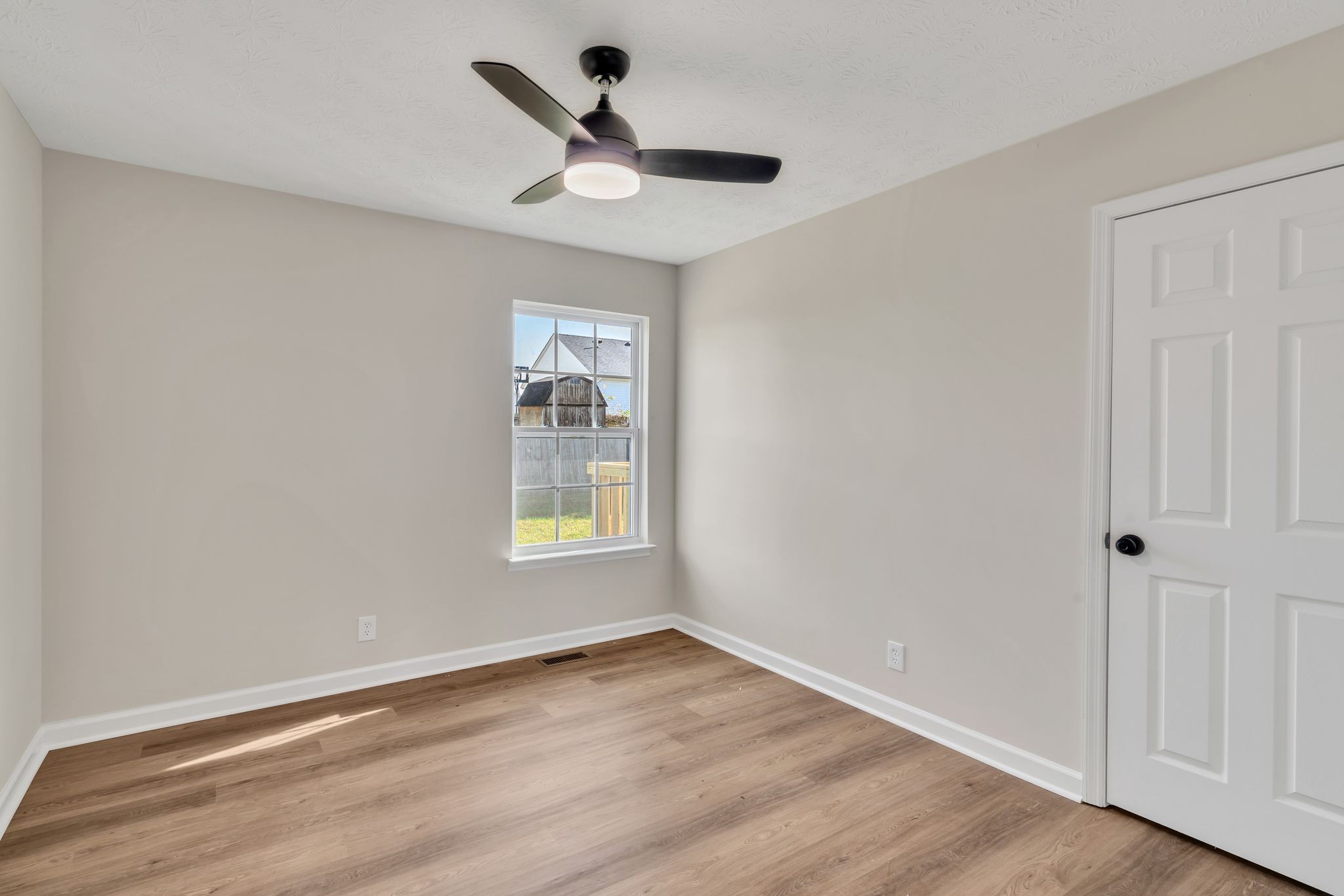 2338 South Main Street Springfield, TN 37172 - Photo 16 of 30 wooden floor in an empty room with a window