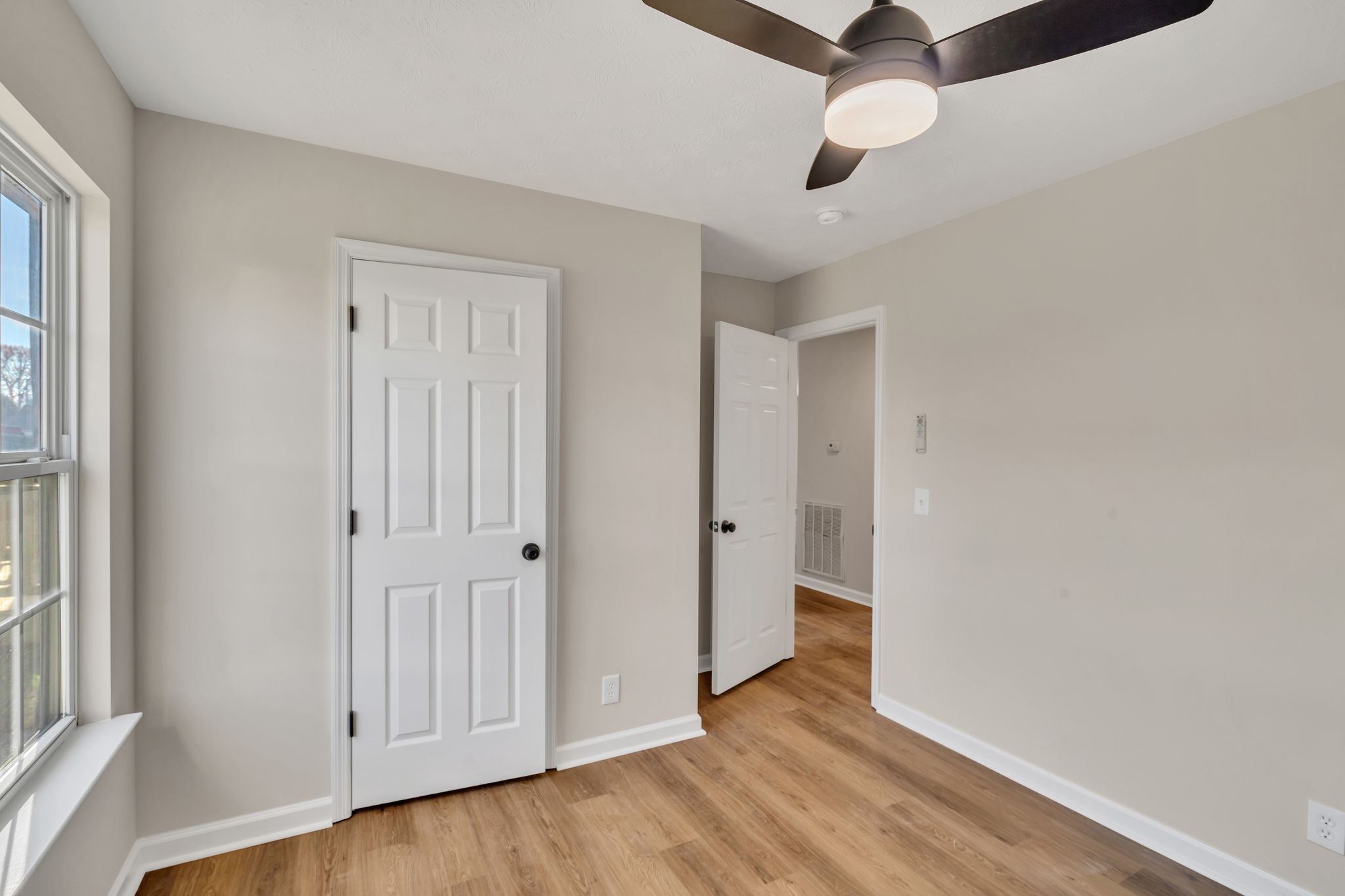 2338 South Main Street Springfield, TN 37172 - Photo 23 of 30 wooden floor in an empty room with a window