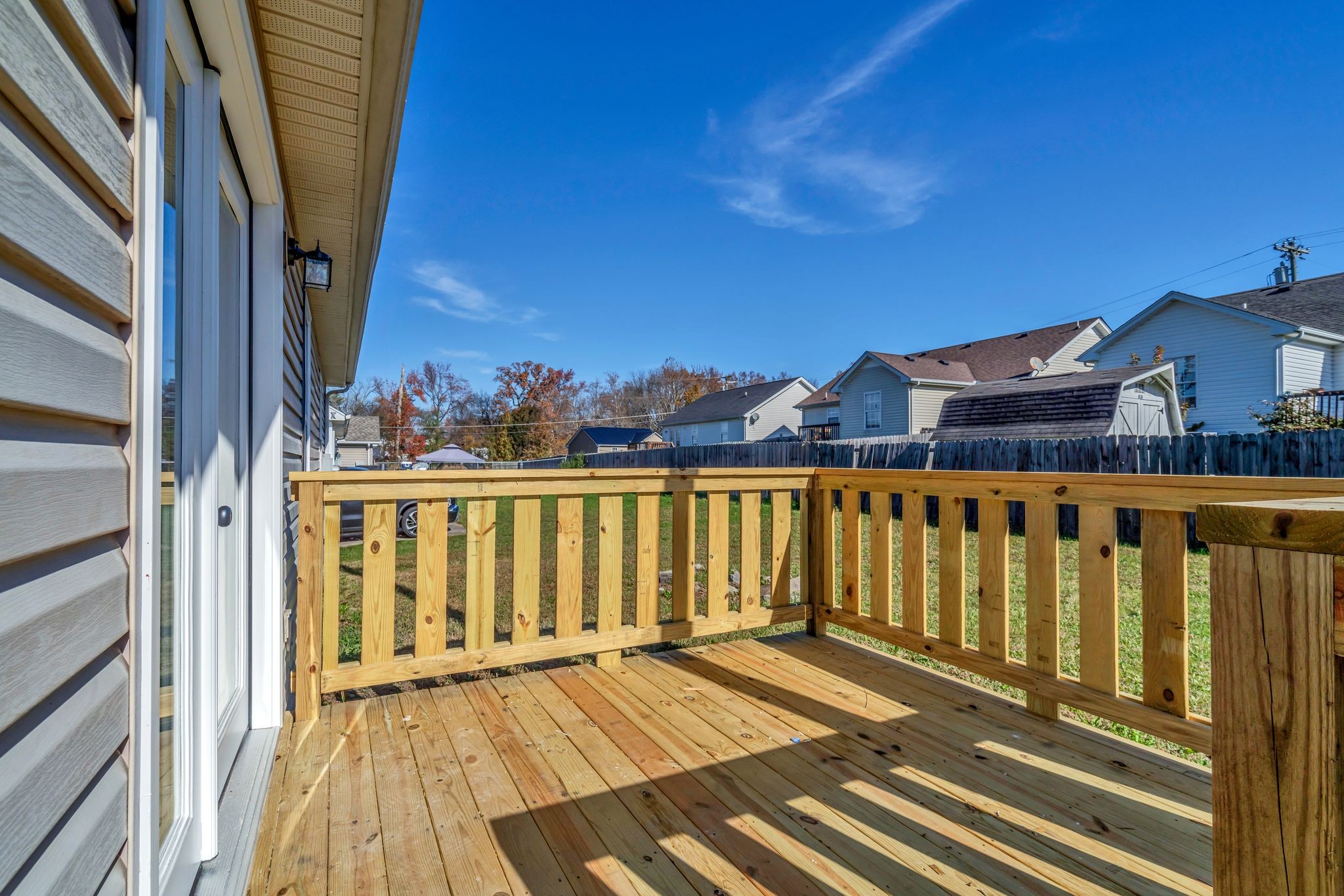 2338 South Main Street Springfield, TN 37172 - Photo 26 of 30 a view of a balcony with wooden floor and fence