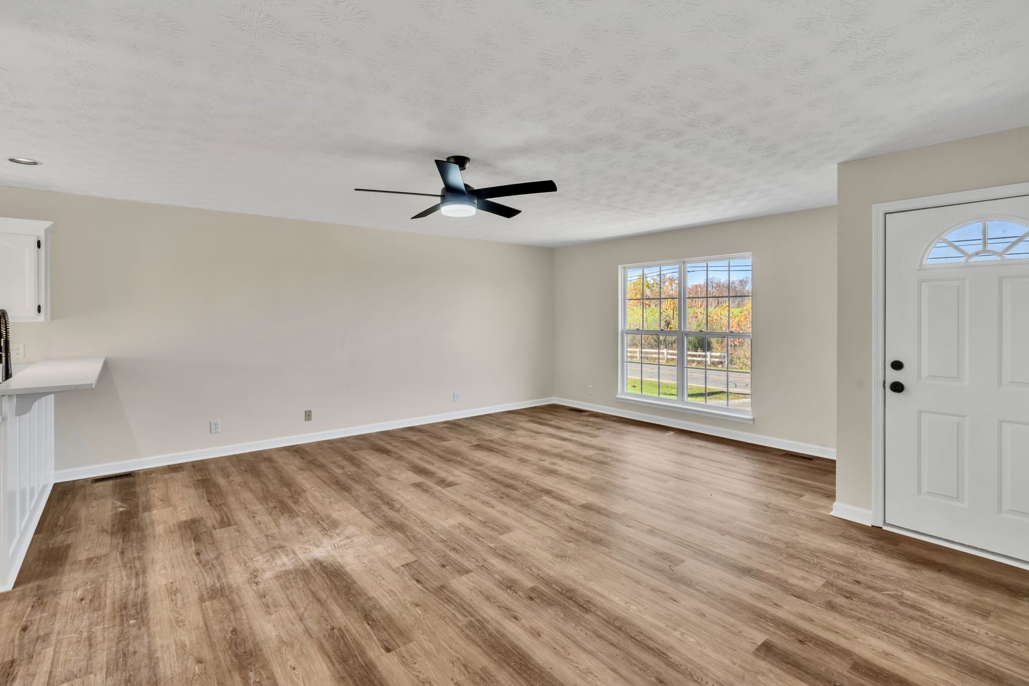 2338 South Main Street Springfield, TN 37172 - Photo 6 of 30 wooden floor in an empty room with a window