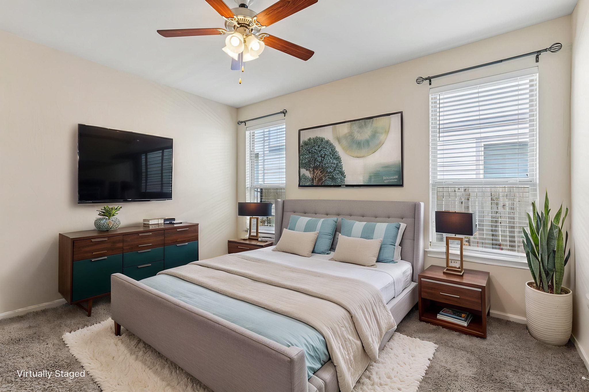 808 Totis Road Austin, TX 78748 - Photo 15 of 40 Bedroom featuring neutral wall paint, two windows with blinds, and a ceiling fan with light fixture