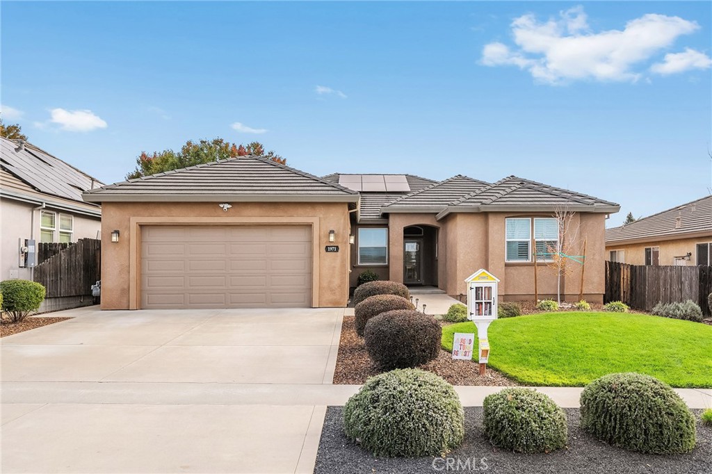 1971 Potter Road Chico, CA 95928 - Photo 11 of 59 a front view of a house with garden