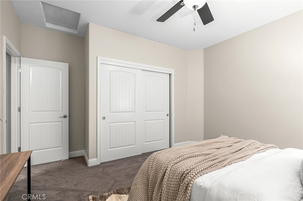 1971 Potter Road Chico, CA 95928 - Photo 30 of 59 a bedroom with a bed and a chandelier