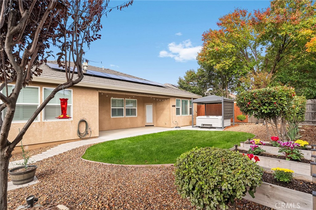 1971 Potter Road Chico, CA 95928 - Photo 45 of 59 a front view of a house with garden
