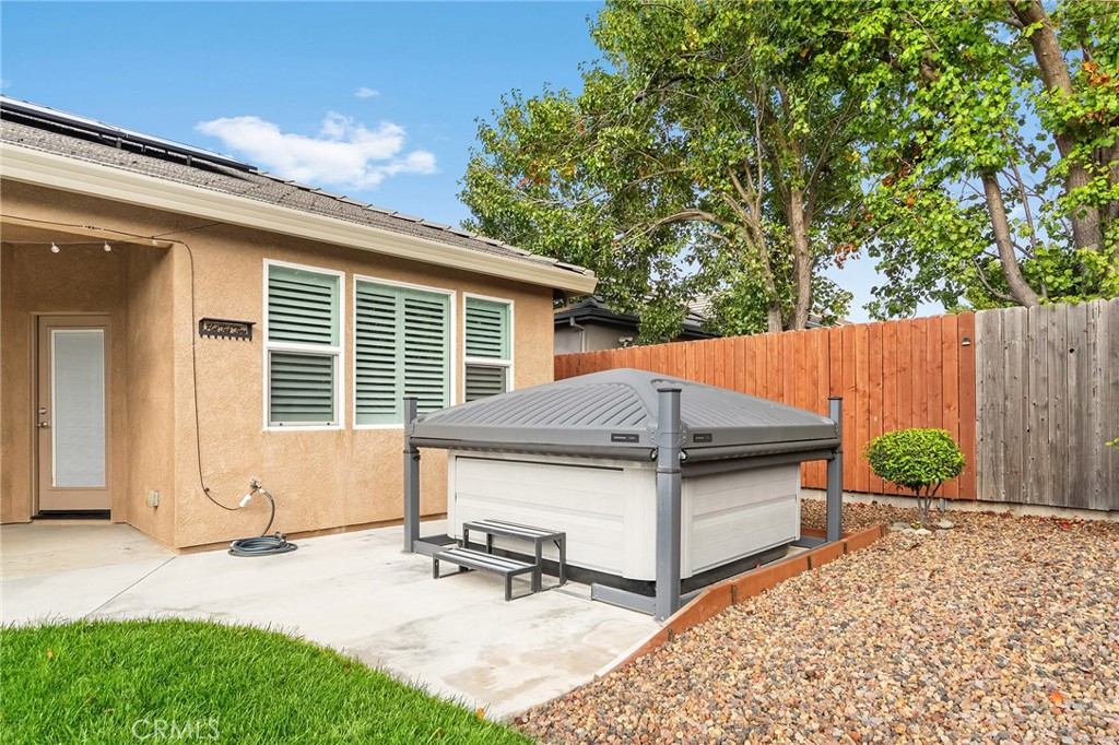 1971 Potter Road Chico, CA 95928 - Photo 50 of 59 a view of a white house with a yard and sitting area