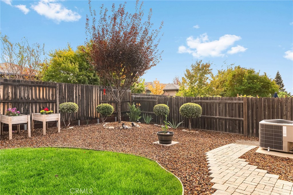 1971 Potter Road Chico, CA 95928 - Photo 53 of 59 a backyard of a house with table and chairs