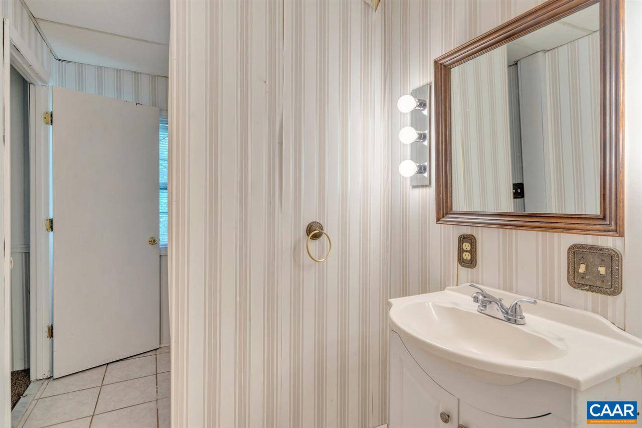 1522 Trailridge Road Charlottesville, VA 22903 - Photo 18 of 22 a bathroom with a sink and a mirror