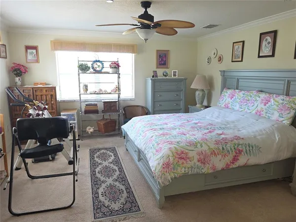 a bedroom with a bed and furniture