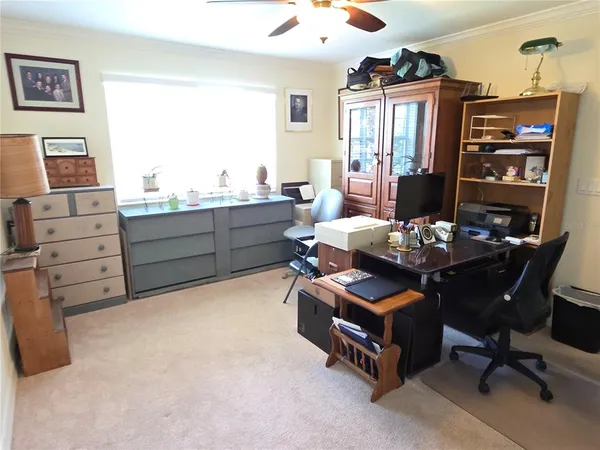 a room with furniture and a window