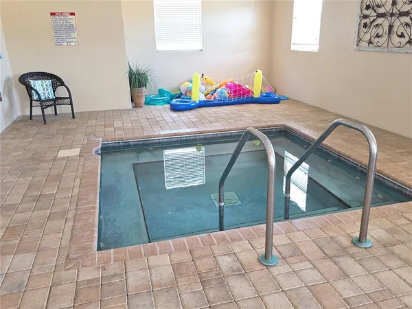 a view of a car park in front of house