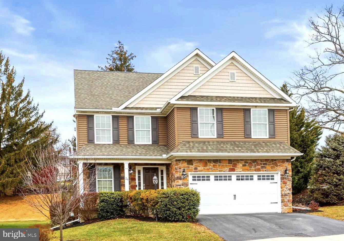 a view of multiple houses with a yard