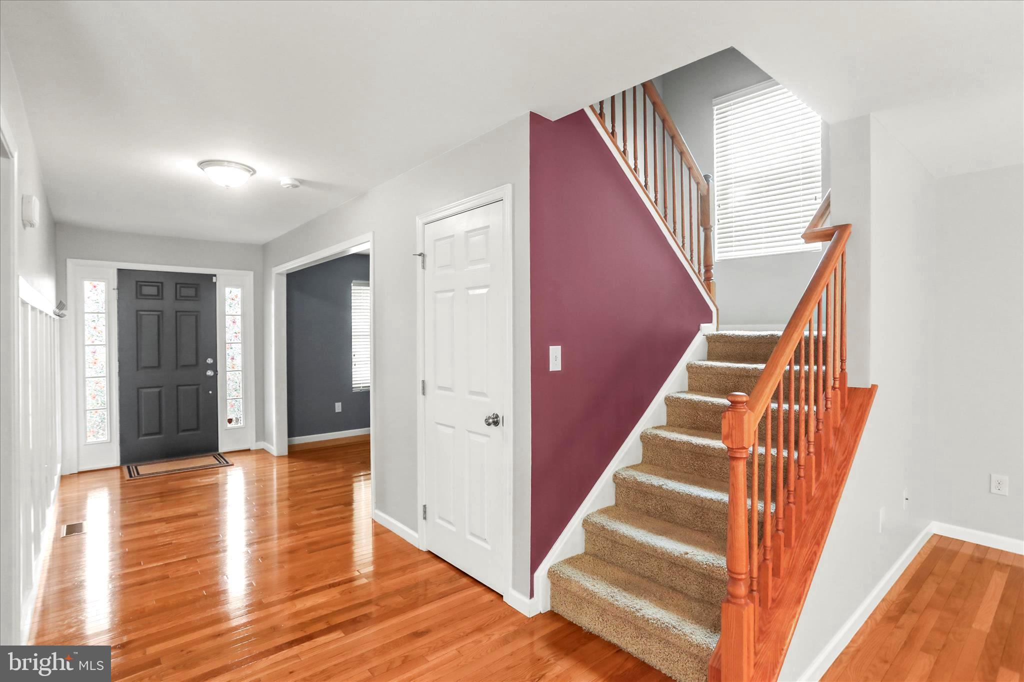 26 South 3rd Street New Freedom, PA 17349 - Photo 16 of 64 a view of a hallway with wooden floor and entryway