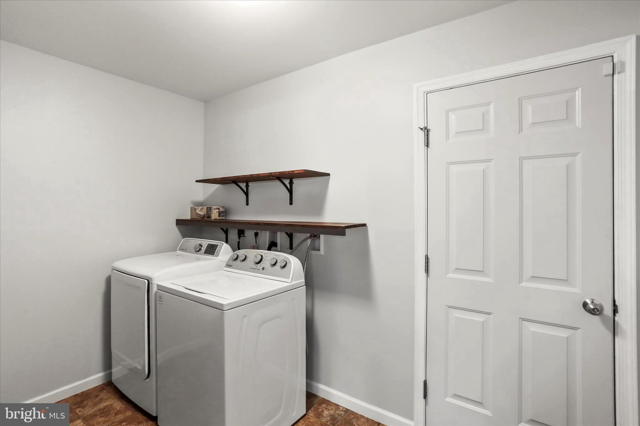 26 South 3rd Street New Freedom, PA 17349 - Photo 27 of 64 a utility room with dryer and washer