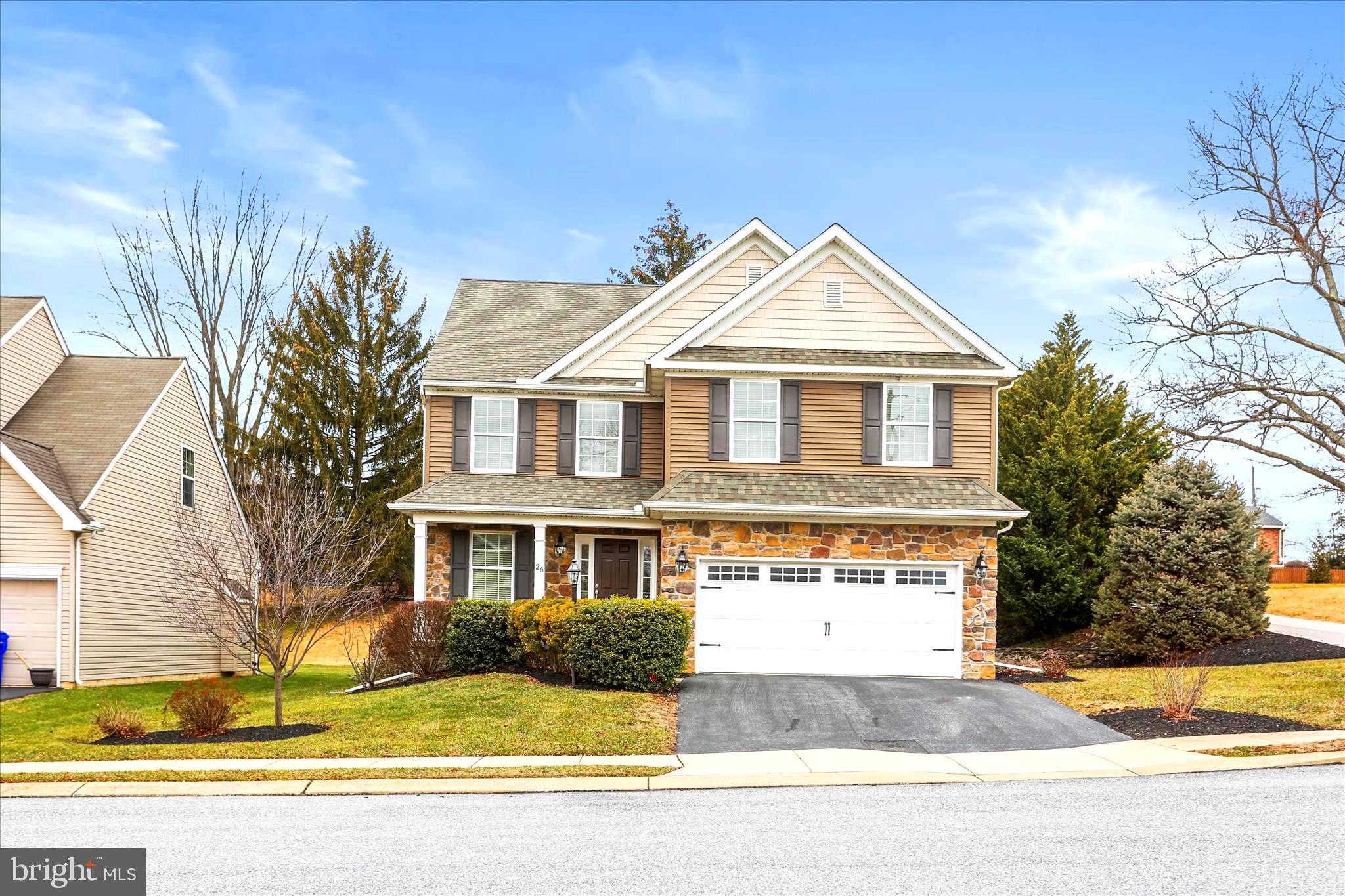 26 South 3rd Street New Freedom, PA 17349 - Photo 3 of 64 a front view of a house with a yard