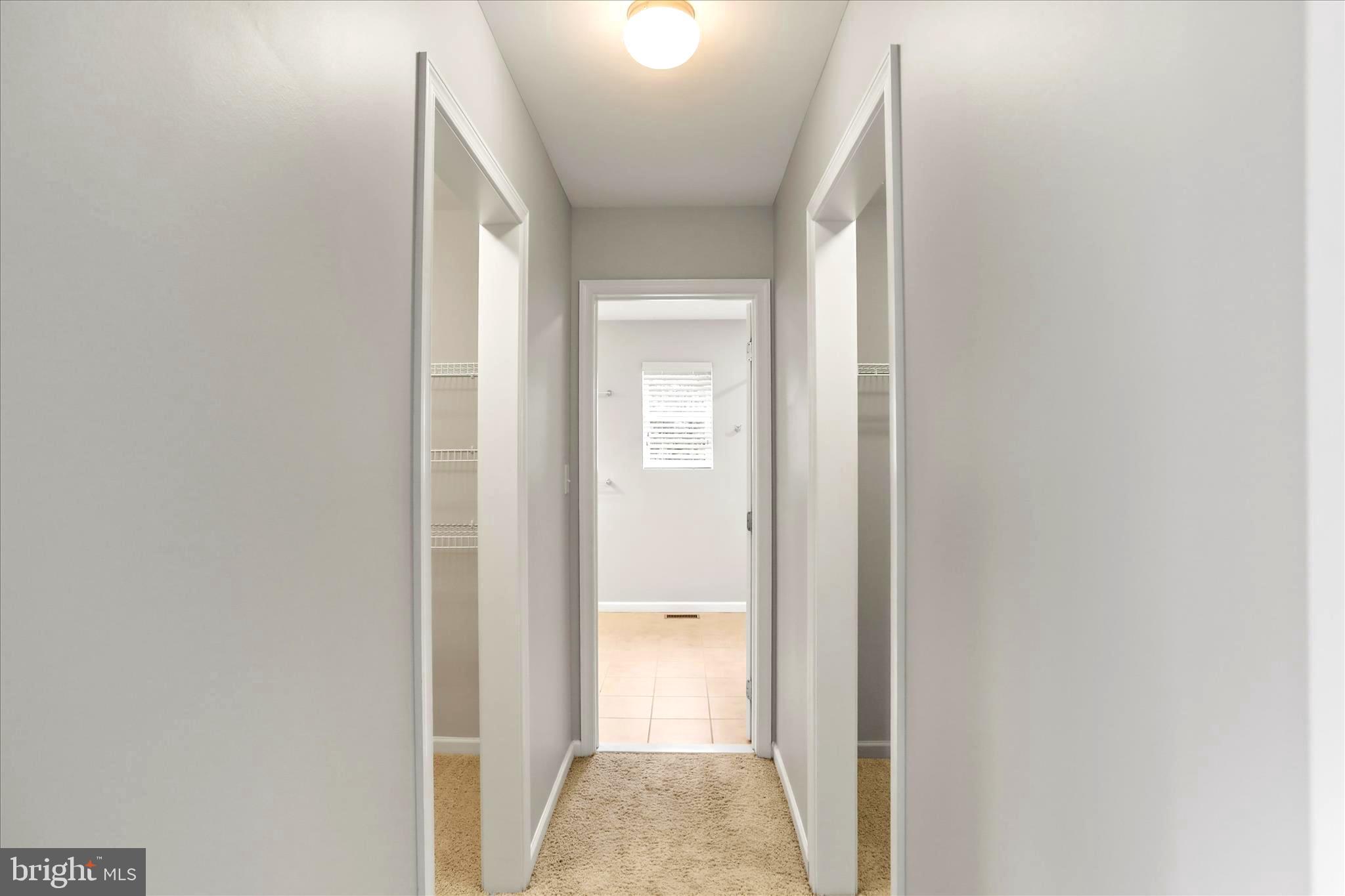 26 South 3rd Street New Freedom, PA 17349 - Photo 35 of 64 a view of a hallway with wooden floor and a bathroom