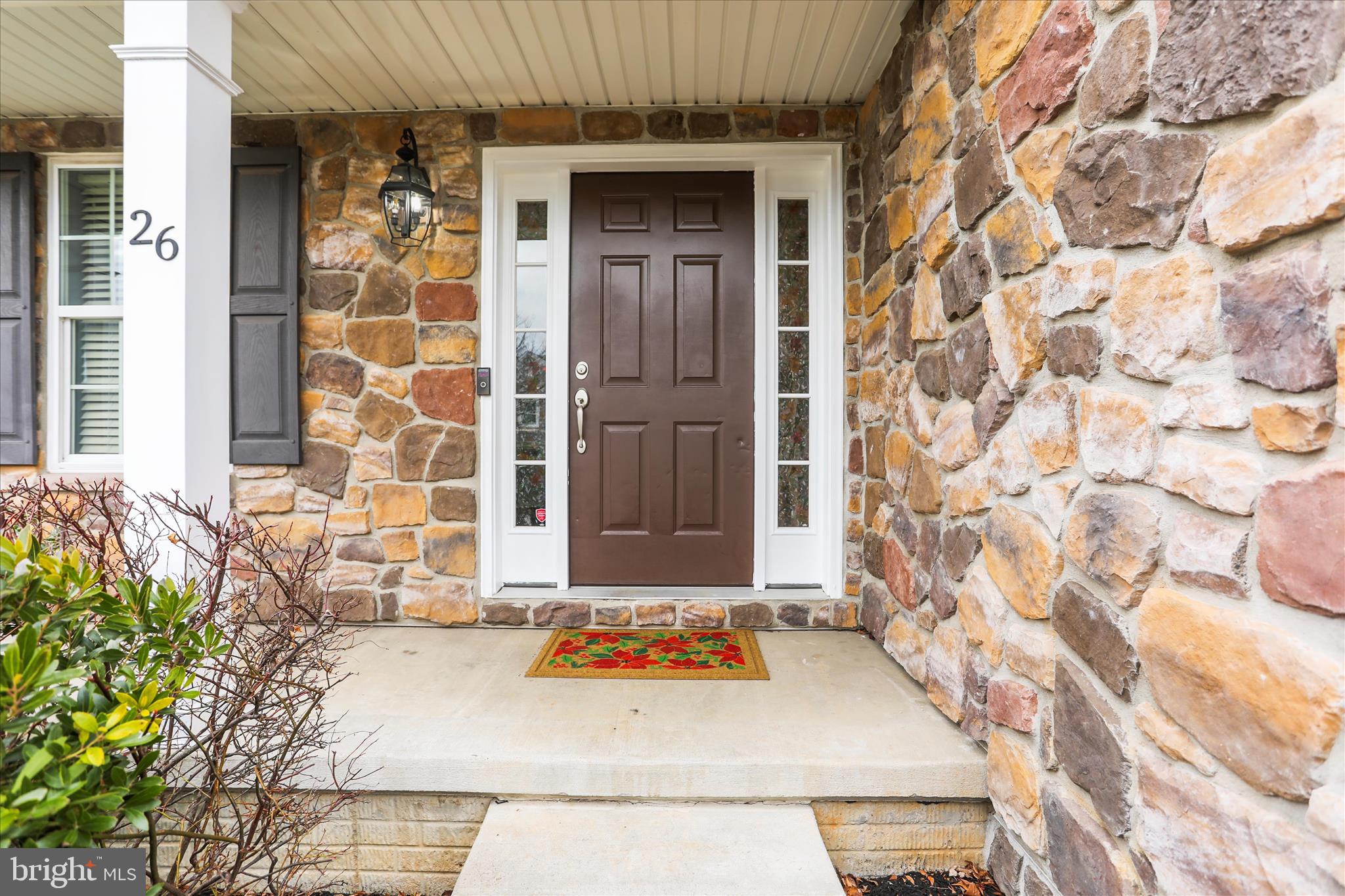 26 South 3rd Street New Freedom, PA 17349 - Photo 5 of 64 front view of a house with a potted plant