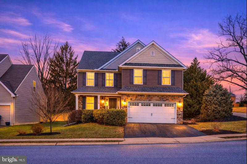 26 South 3rd Street New Freedom, PA 17349 - Photo 9 of 64 a front view of a house with a yard