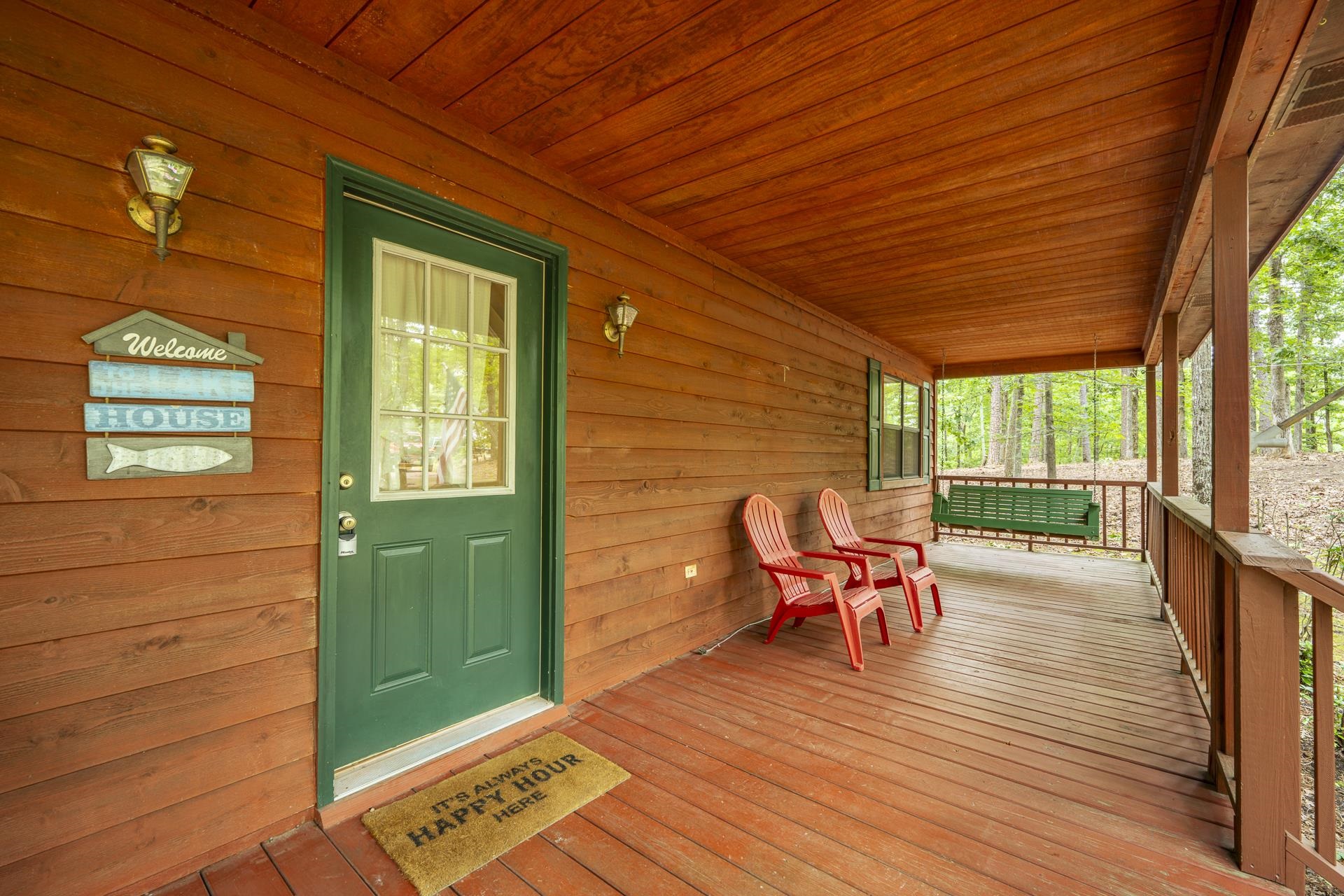 405 Murray Lane Counce, TN 38326 - Photo 32 of 36 a balcony with furniture and wooden floor