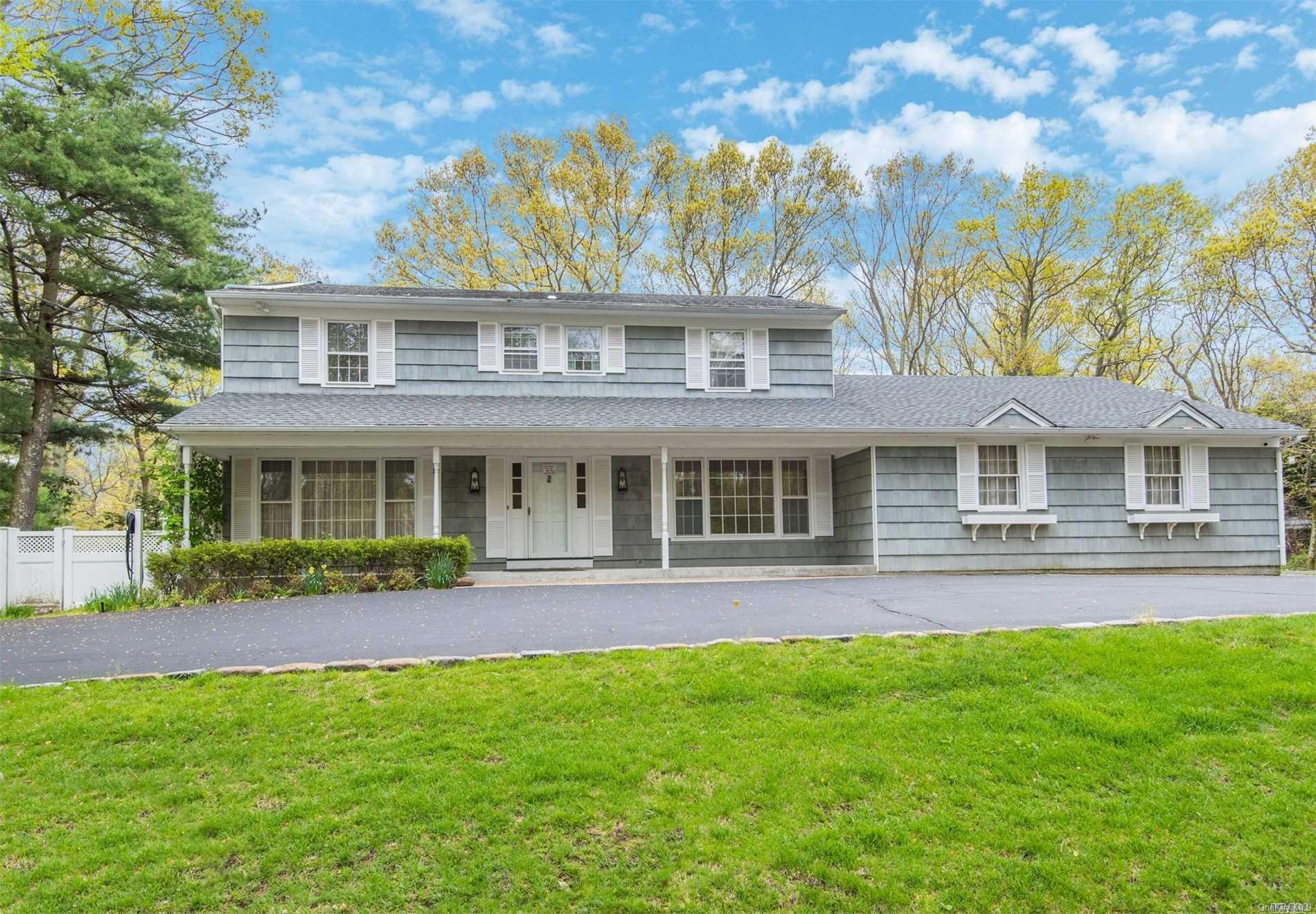 117 Mt Grey Road Old Field, NY 11733 - Photo 1 of 1 a front view of a house with a yard