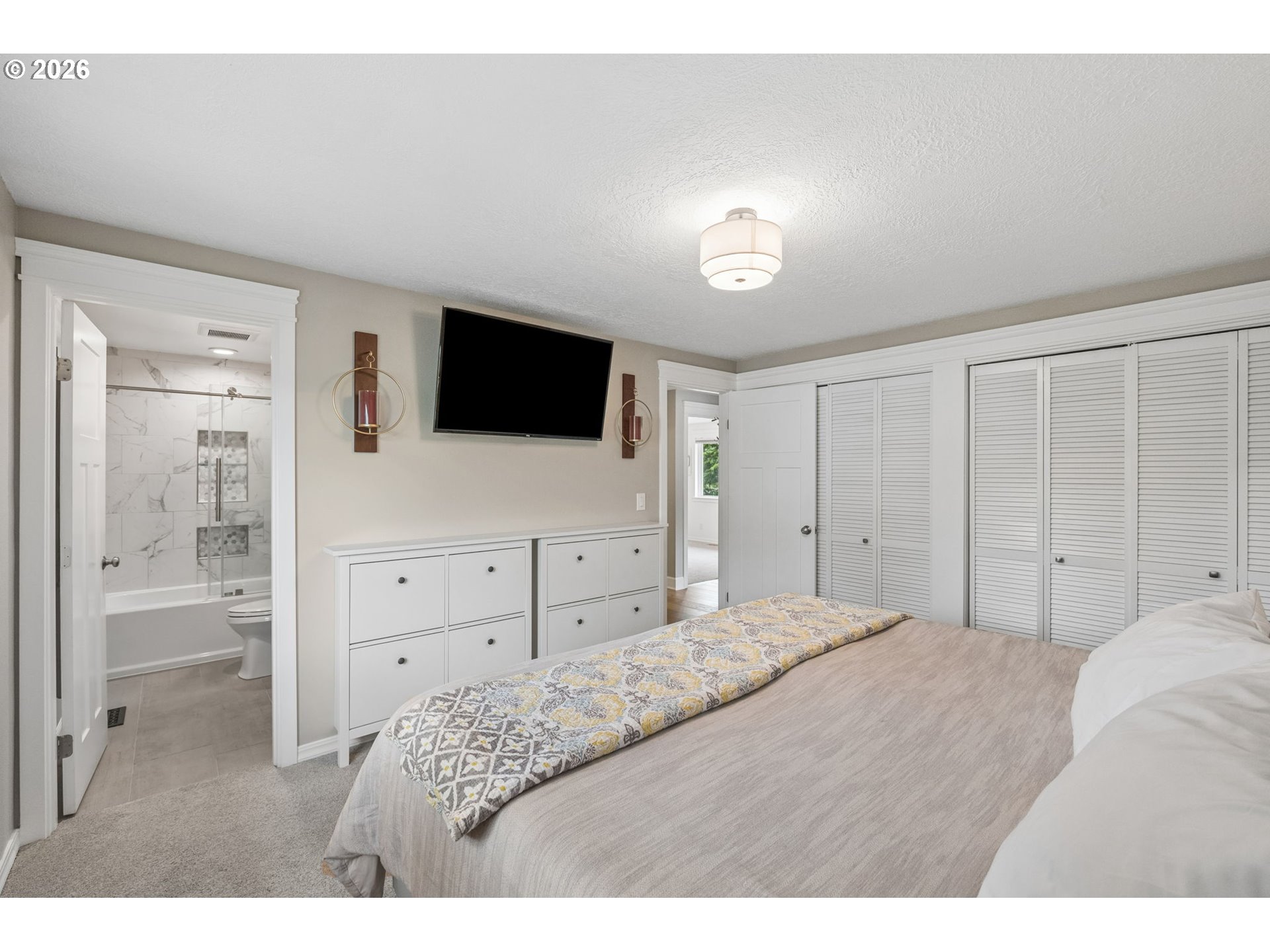 6330 Southwest Fisher Avenue Beaverton, OR 97008 - Photo 18 of 48 a bedroom with a bed a window and a television