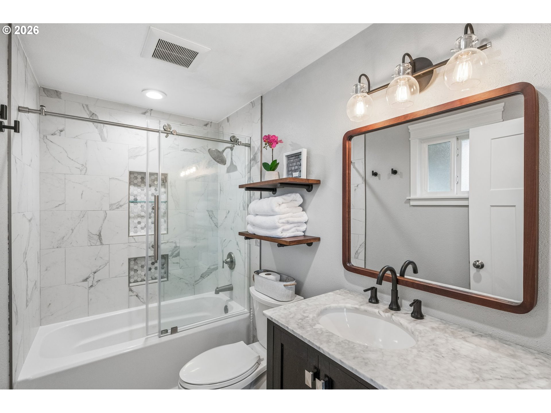 6330 Southwest Fisher Avenue Beaverton, OR 97008 - Photo 19 of 48 a bathroom with a granite countertop sink mirror toilet and bathtub