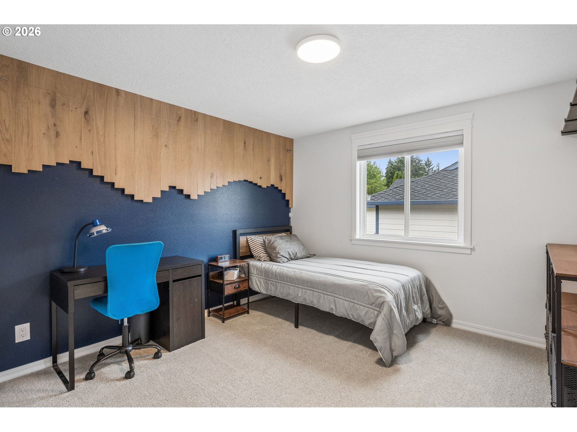 6330 Southwest Fisher Avenue Beaverton, OR 97008 - Photo 20 of 48 a bedroom with furniture and a window
