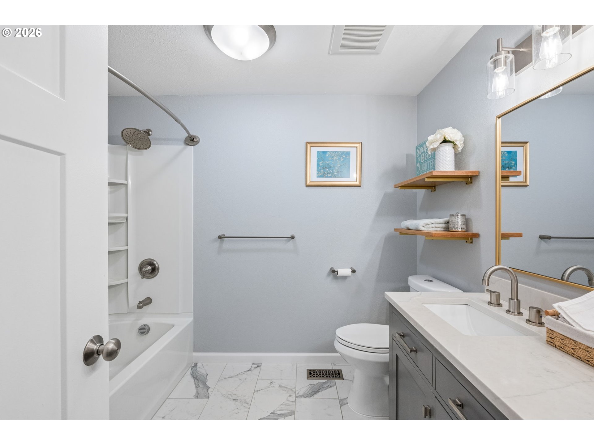 6330 Southwest Fisher Avenue Beaverton, OR 97008 - Photo 22 of 48 a bathroom with a sink a toilet and shower