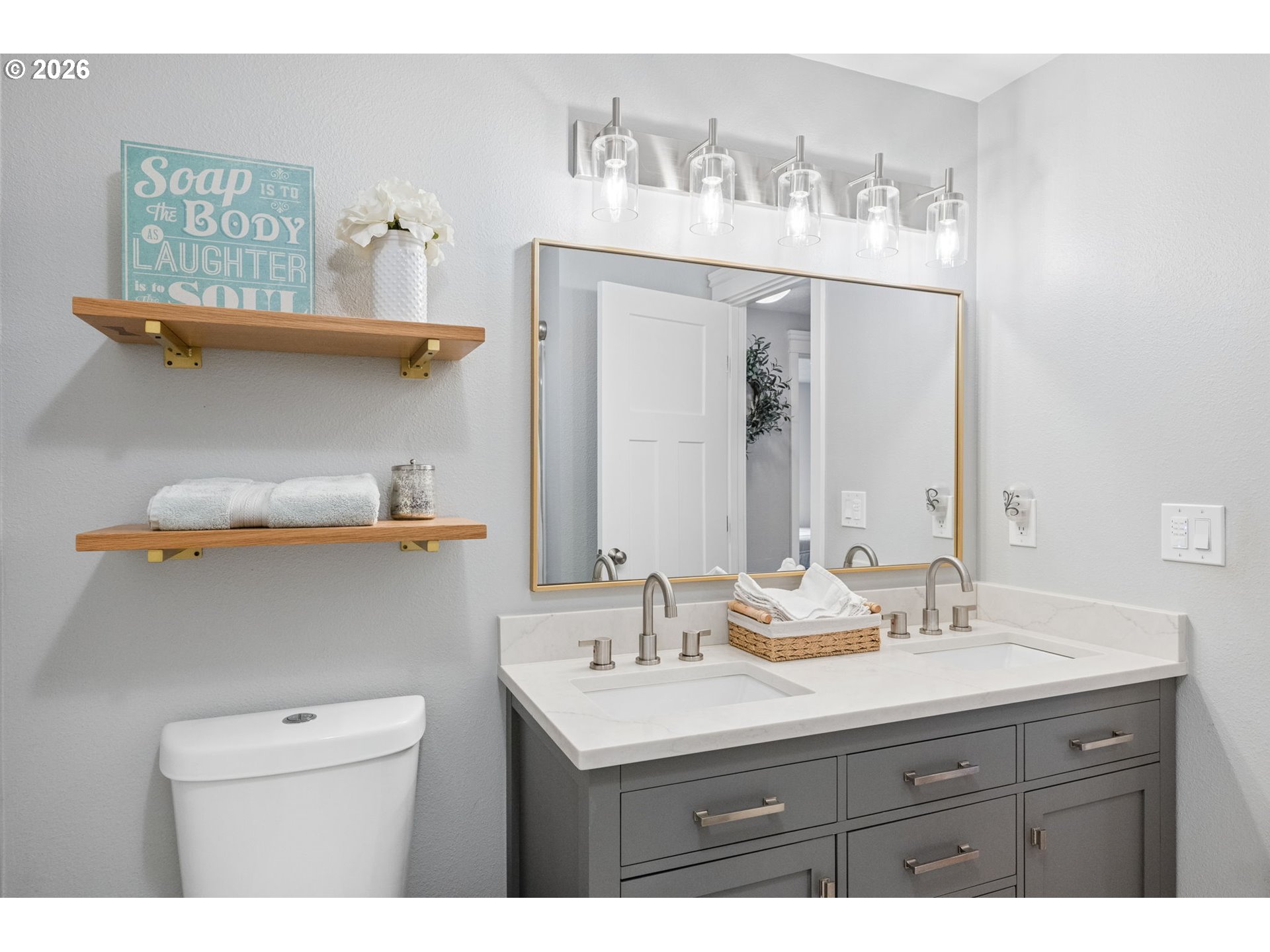 6330 Southwest Fisher Avenue Beaverton, OR 97008 - Photo 23 of 48 a bathroom with a sink mirror and vanity