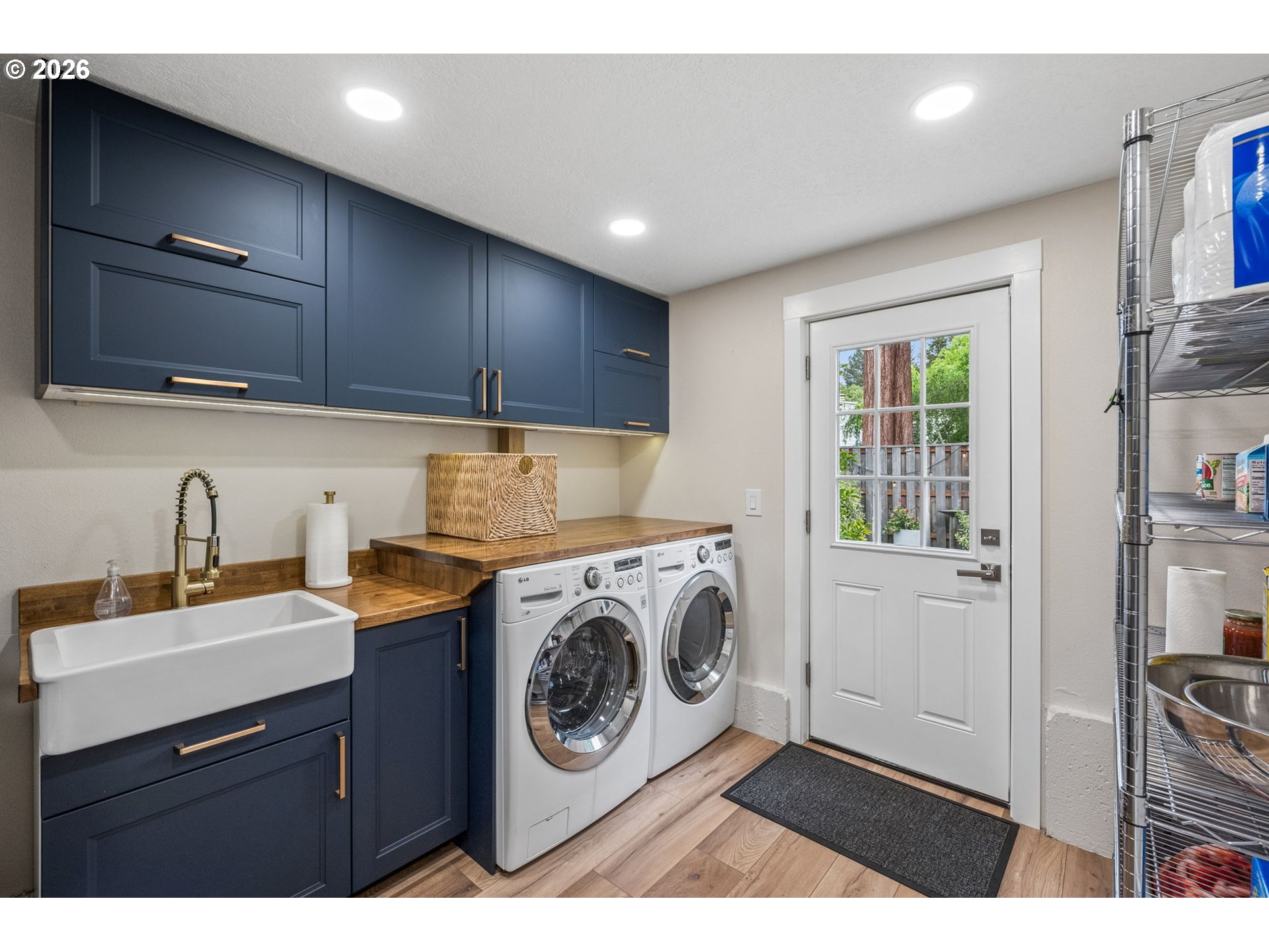 6330 Southwest Fisher Avenue Beaverton, OR 97008 - Photo 31 of 48 a utility room with sink dryer and washer