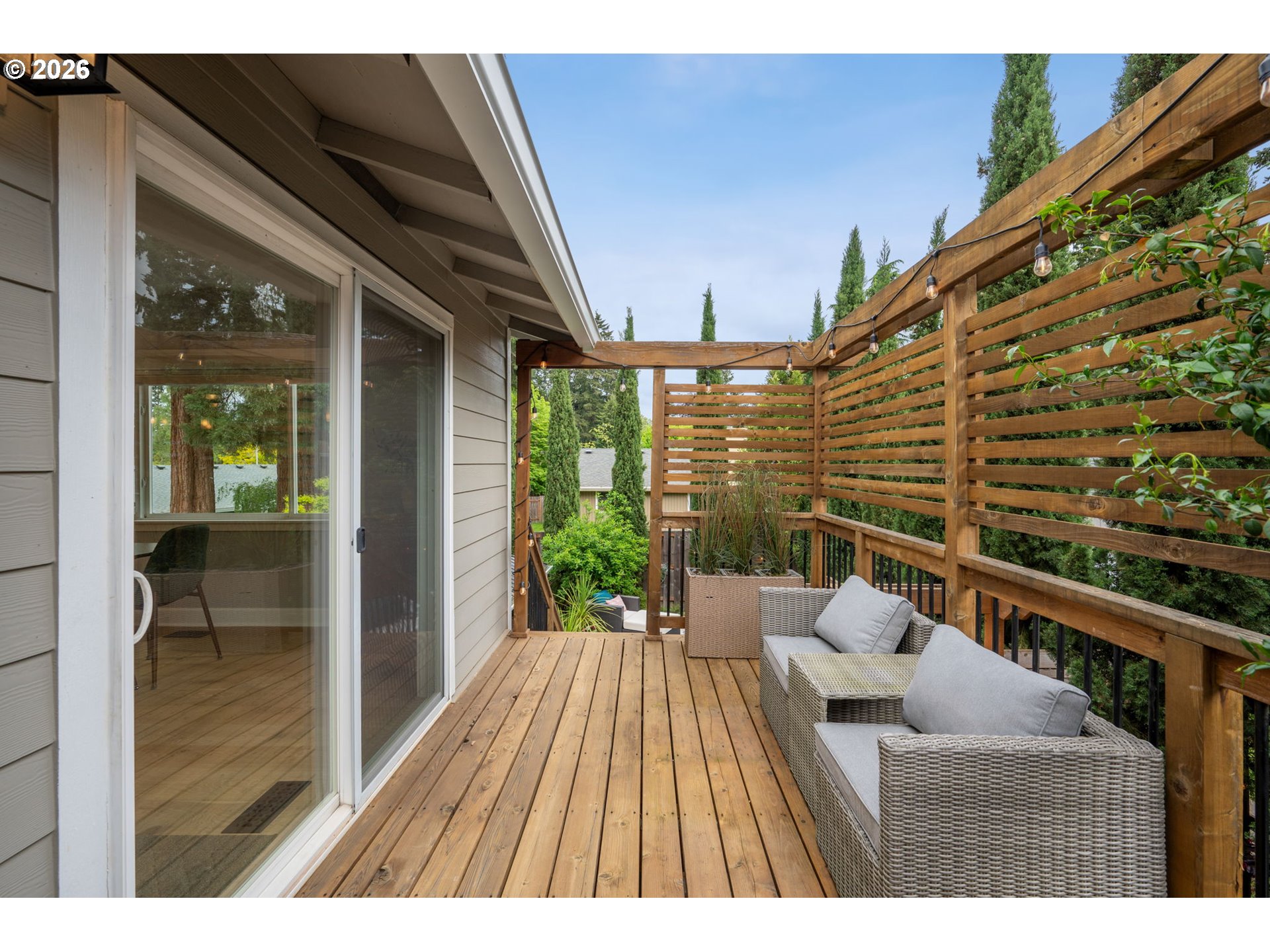 6330 Southwest Fisher Avenue Beaverton, OR 97008 - Photo 38 of 48 a view of balcony with wooden floor and seating space