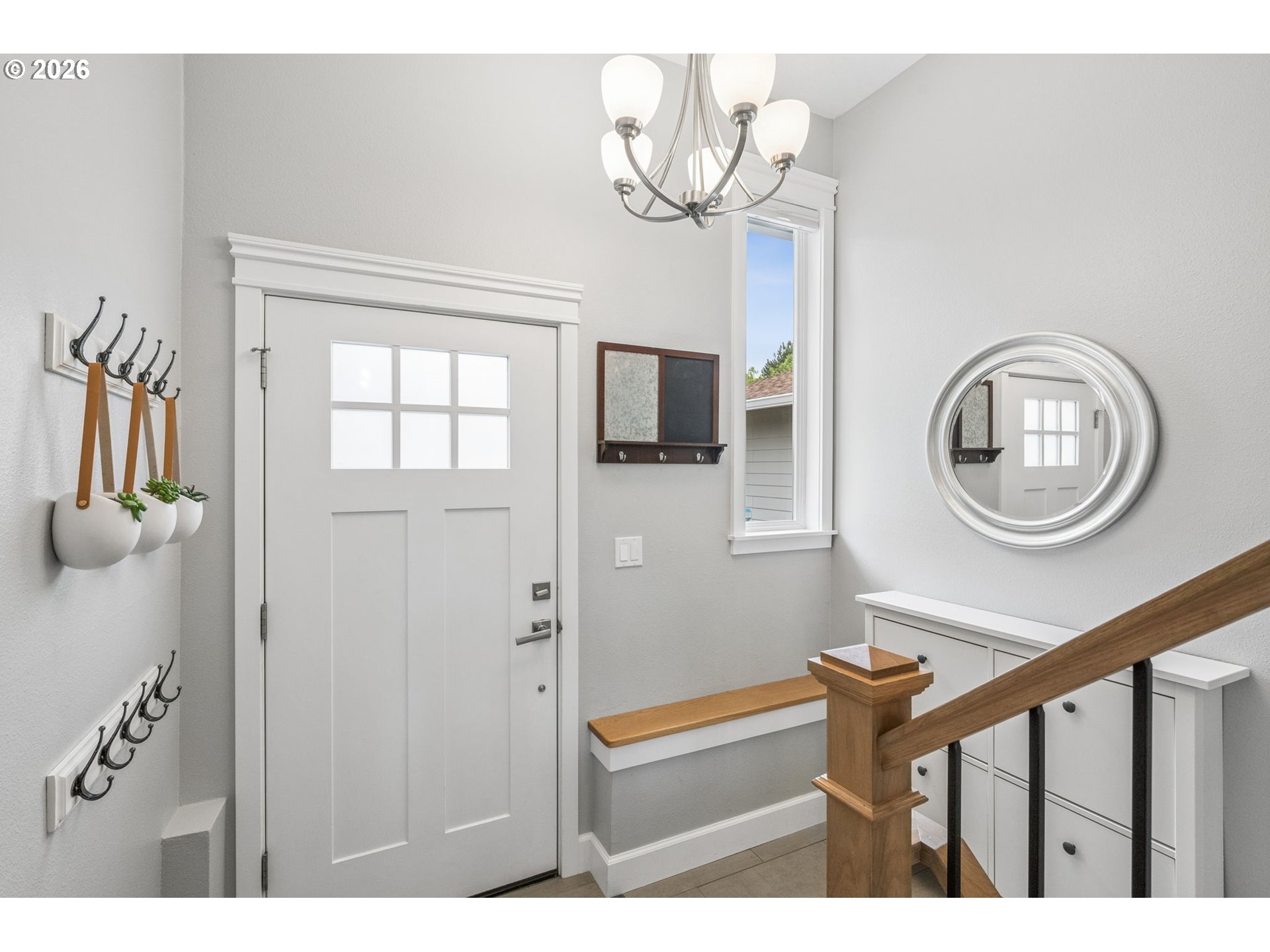 6330 Southwest Fisher Avenue Beaverton, OR 97008 - Photo 4 of 48 a view of entryway with wooden floor