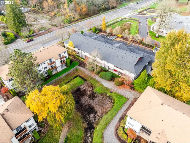 a view of swimming pool with a yard