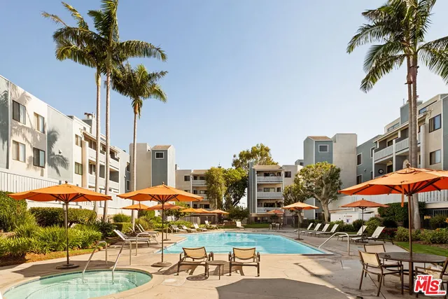 a group of cars parked in front of building